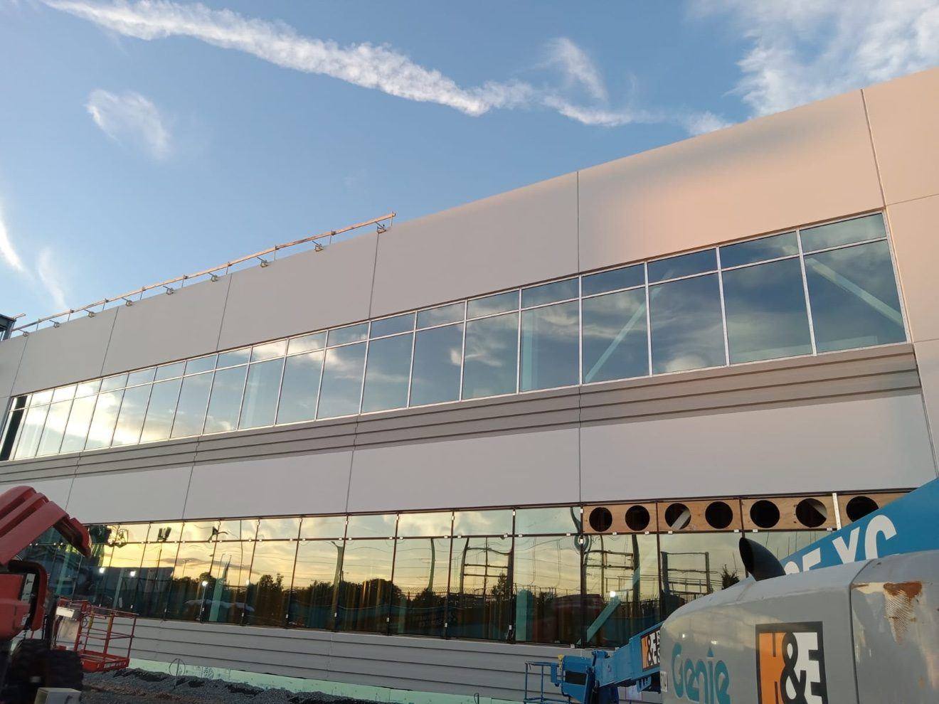 Curtain wall at dusk — commercial building
